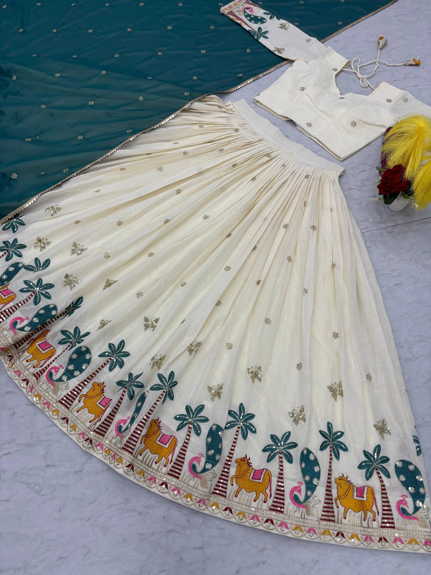 Lvory Lehenga With Animal Heavy Embroidery Thread & Sequence Work Border And Teal Dupatta Elegance.