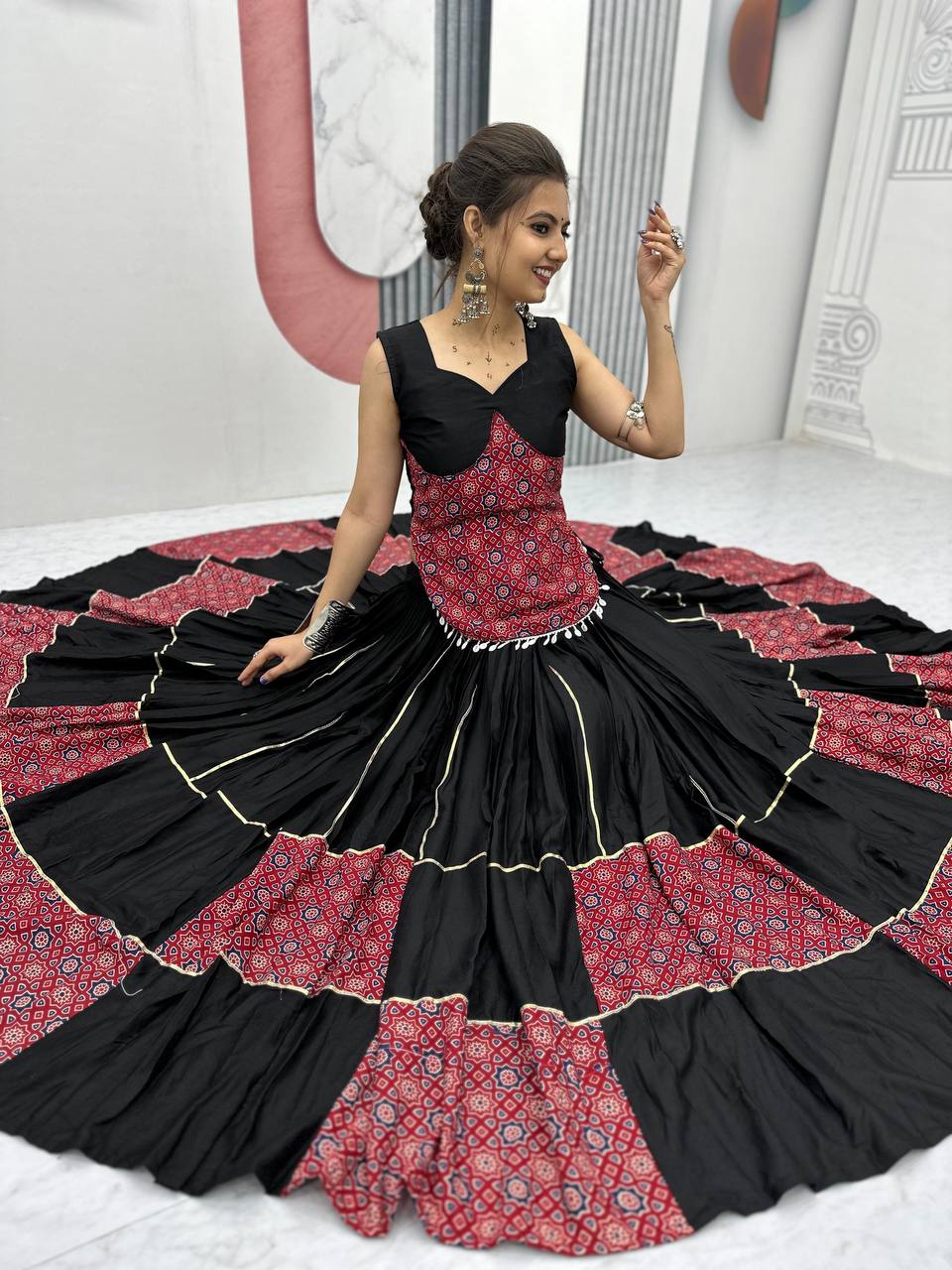 Black And Red Traditional Flared Lehenga With Printed Blouse.