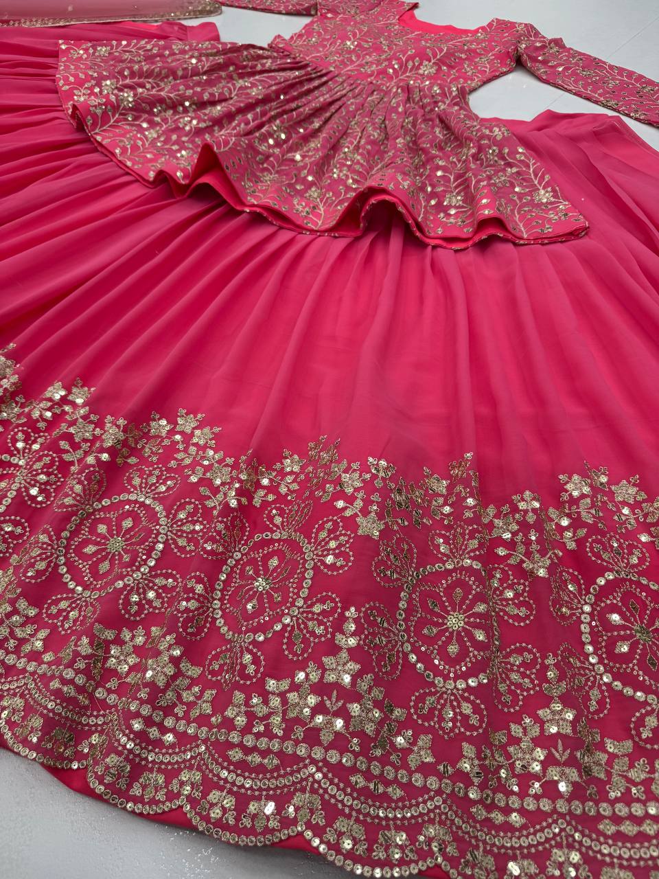 Elegant Pink Peplum Lehenga with Sequin Embroidery and Dupatta