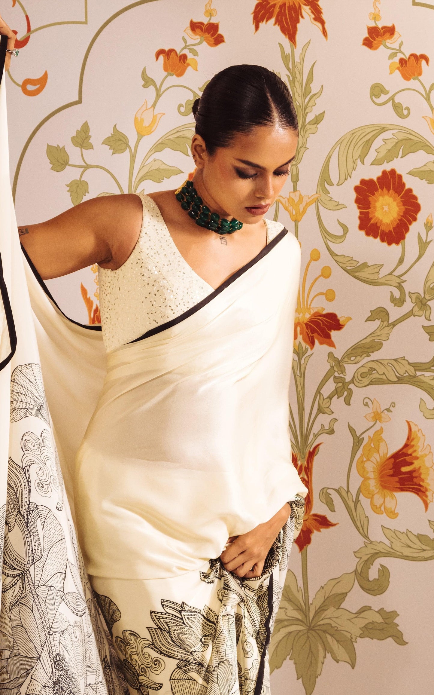 Elegant Ivory Saree with Black Floral Sketch Style Detailing