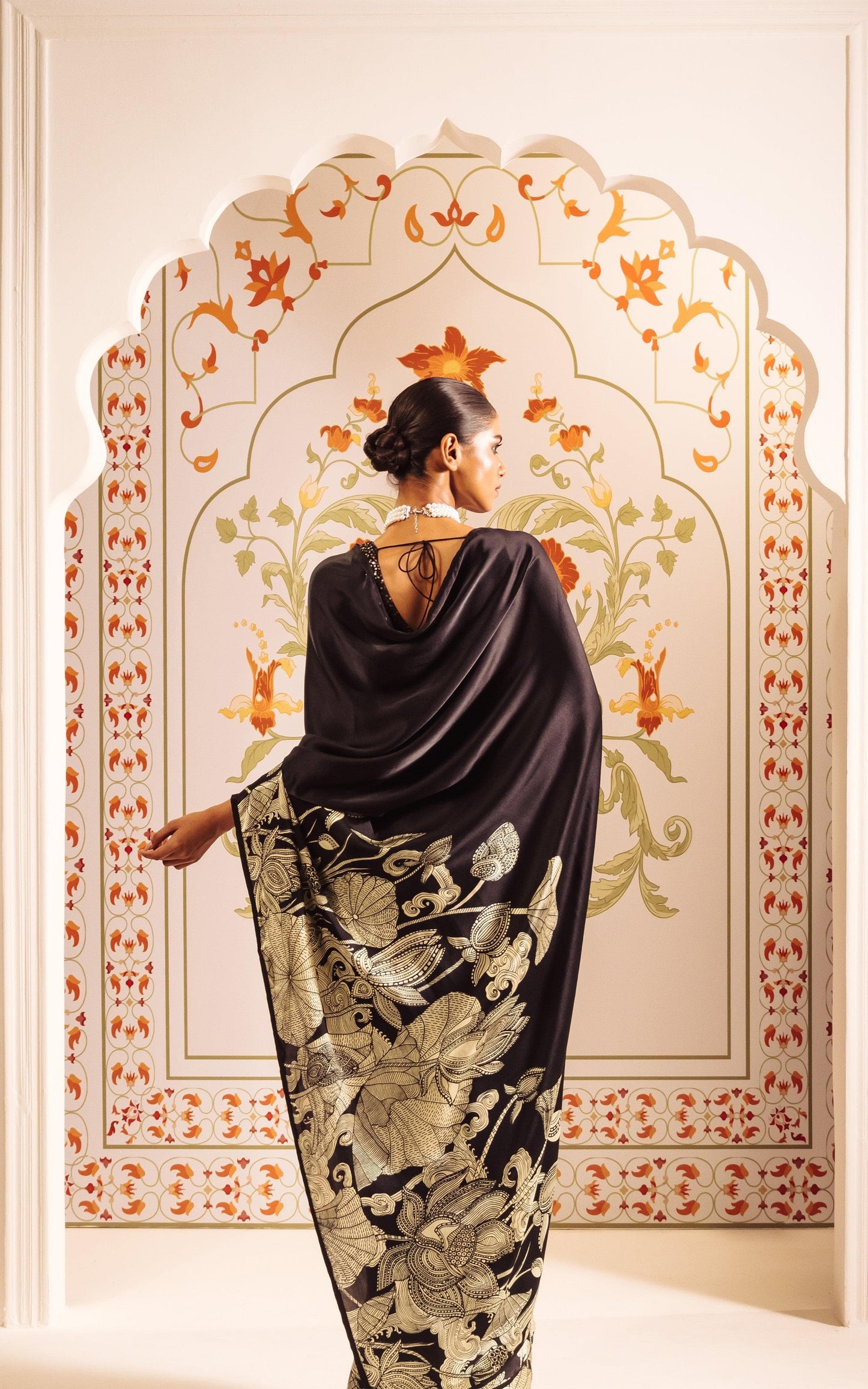 Elegant Ivory Saree with Black Floral Sketch Style Detailing