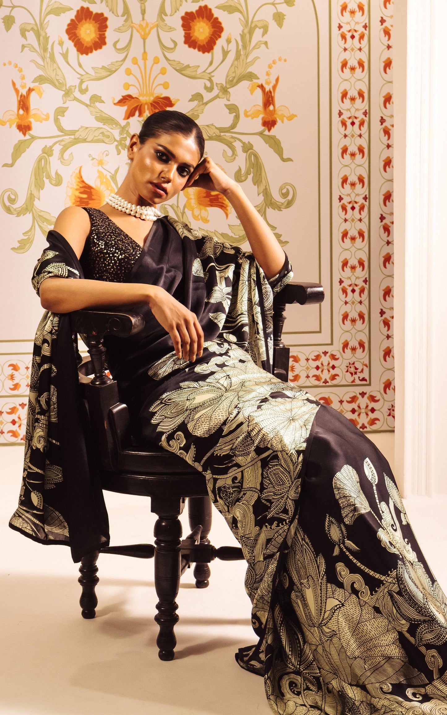 Elegant Ivory Saree with Black Floral Sketch Style Detailing