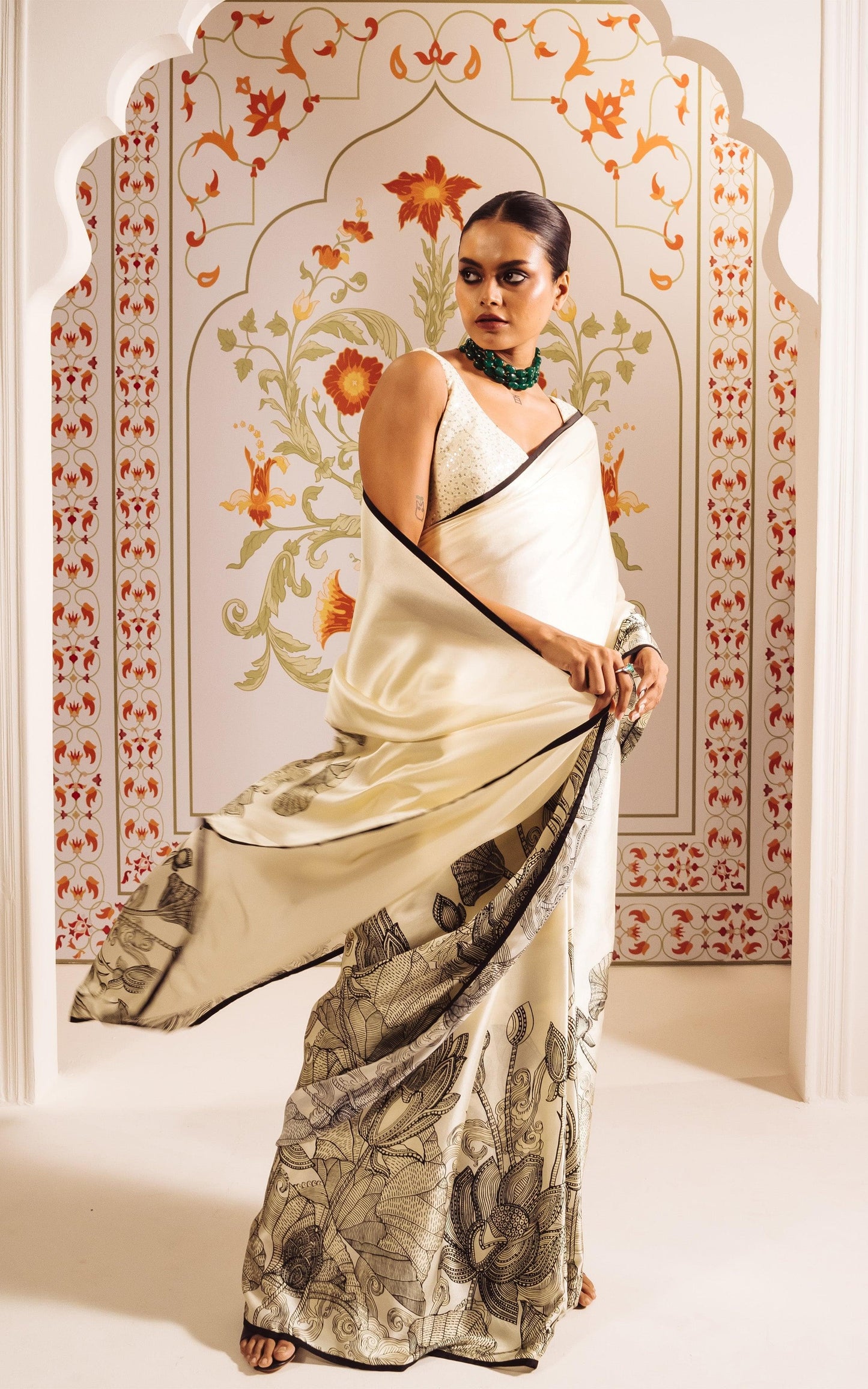 Elegant Ivory Saree with Black Floral Sketch Style Detailing