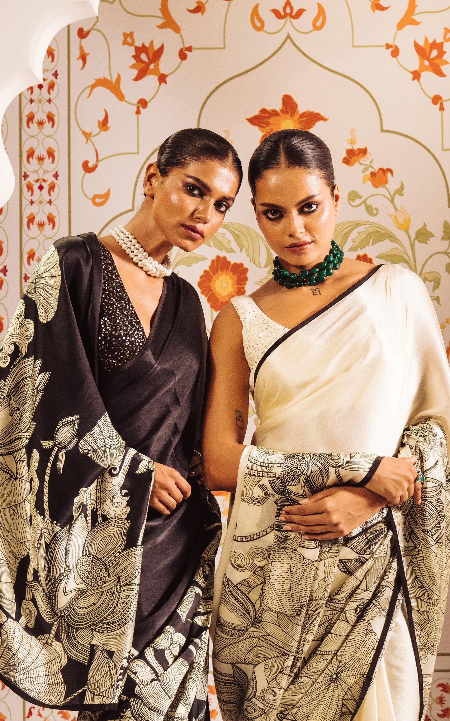 Elegant Ivory Saree with Black Floral Sketch Style Detailing