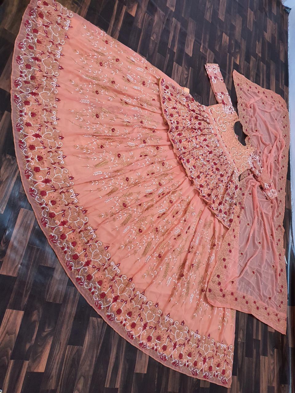 Latest designer peach color lehenga with top