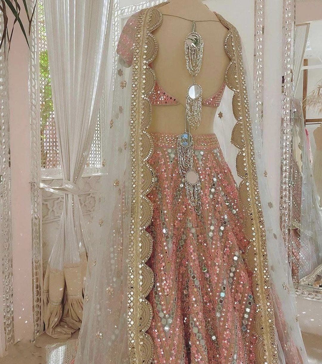 Peach Color Party Wear Designer Net Heavy Embroidered Lehenga