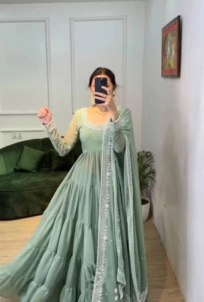 TRENDY PISTA GREEN COLOR RUFFLE STYLE ANARKALI GOWN