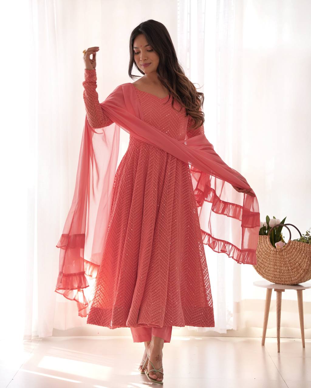 Elegant Peach Anarkali Suit with Embroidered Details and Ruffle Dupatta