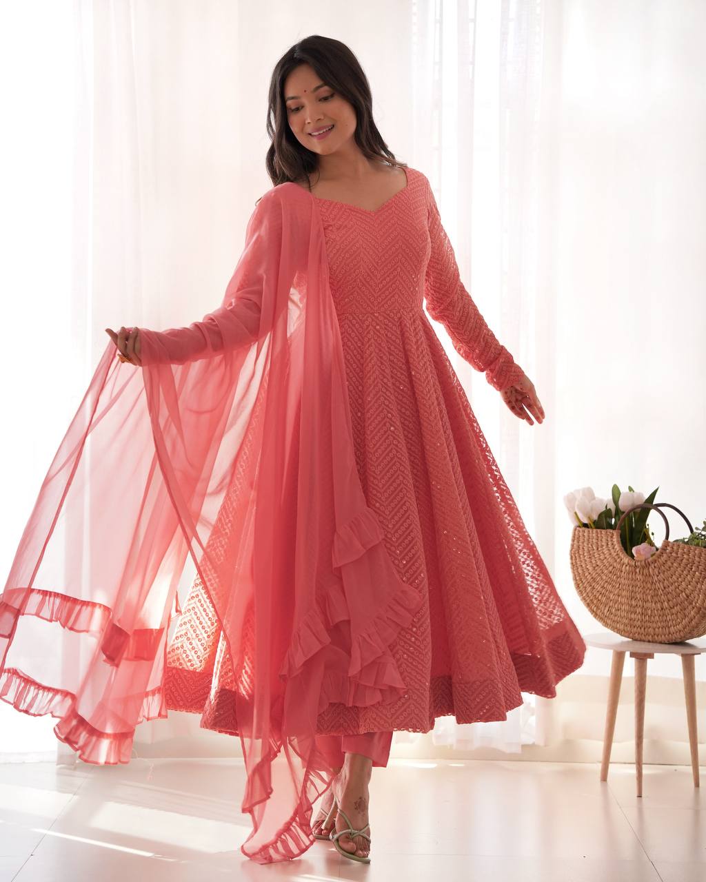 Elegant Peach Anarkali Suit with Embroidered Details and Ruffle Dupatta