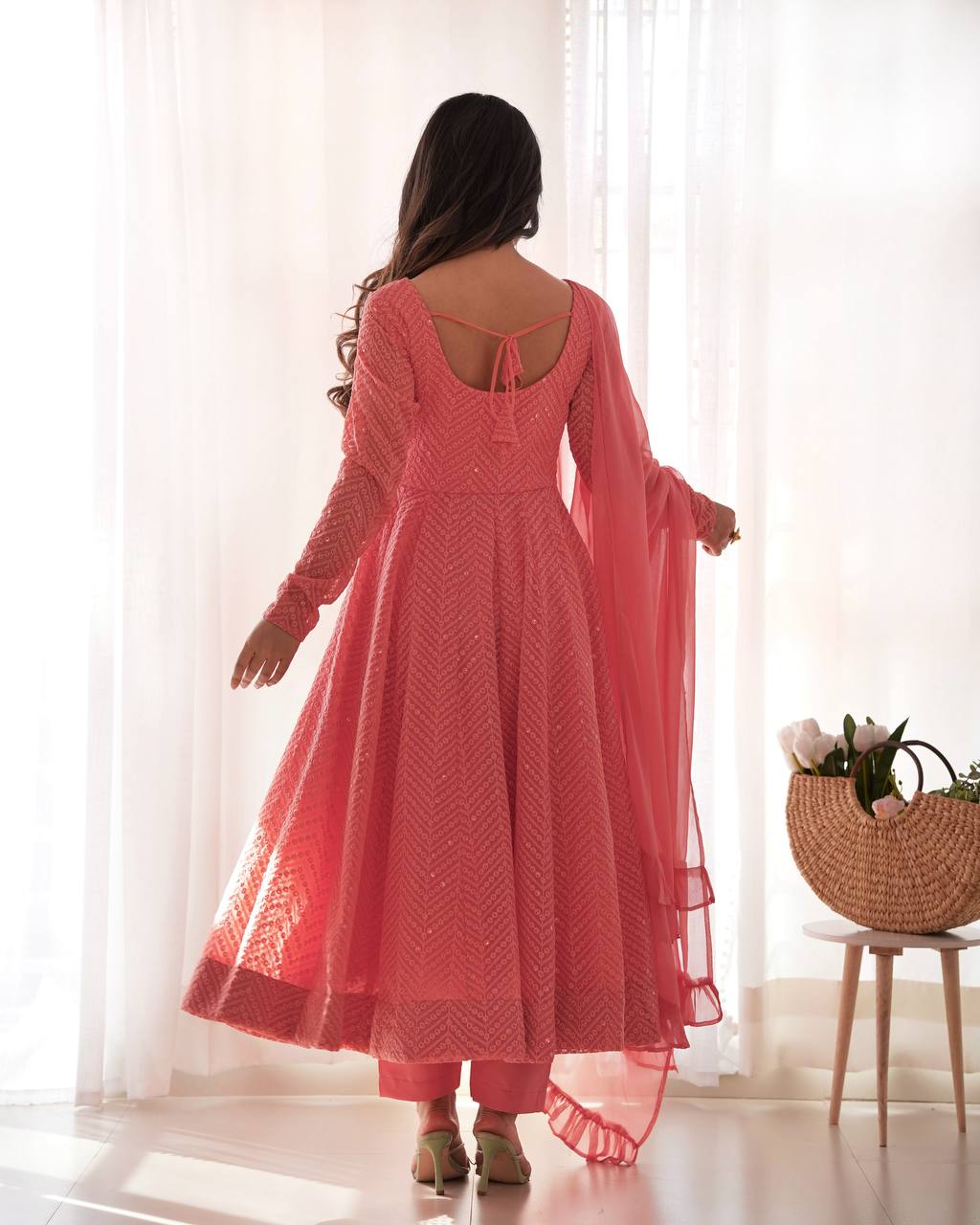 Elegant Peach Anarkali Suit with Embroidered Details and Ruffle Dupatta