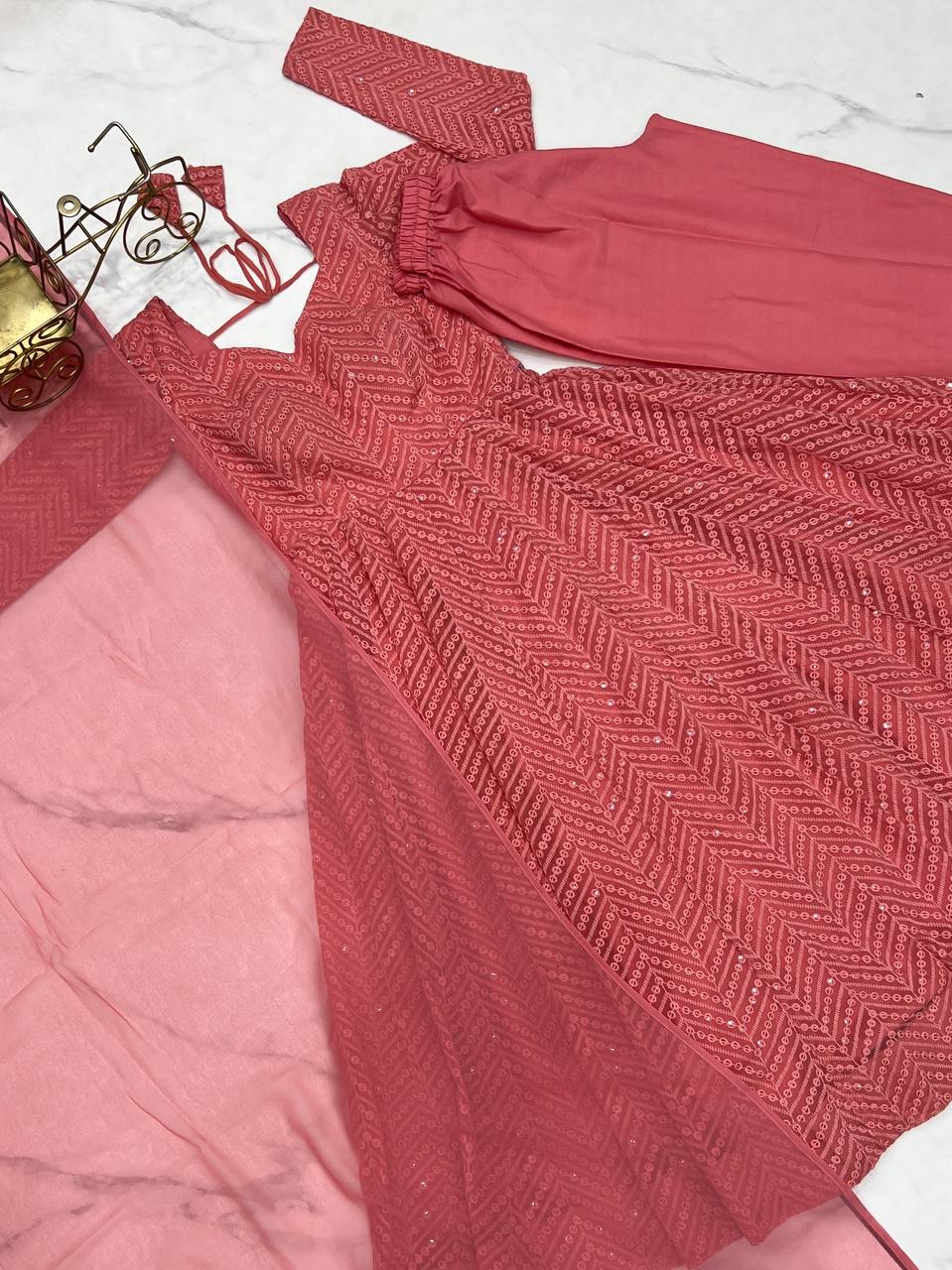 Elegant Peach Anarkali Suit with Embroidered Details and Ruffle Dupatta