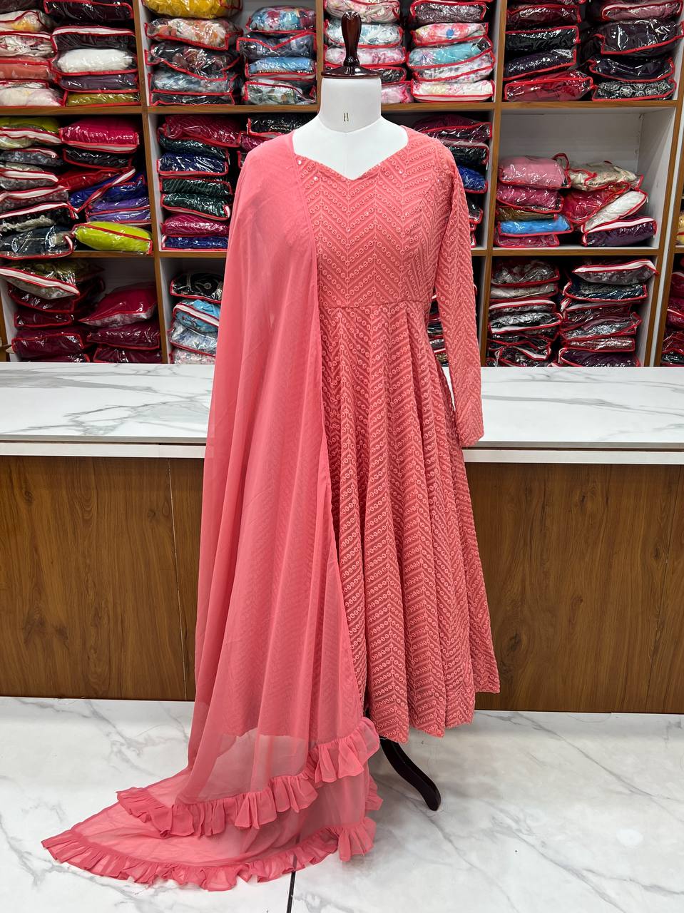 Elegant Peach Anarkali Suit with Embroidered Details and Ruffle Dupatta