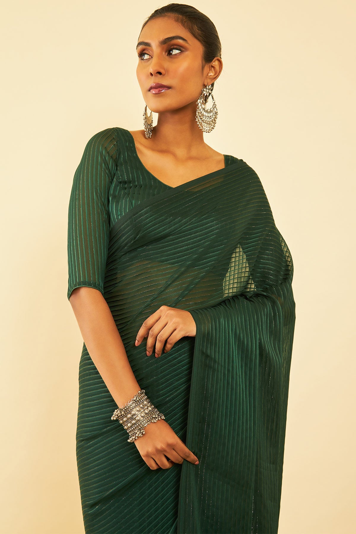 Green Chiffon Striped Saree With Tassels