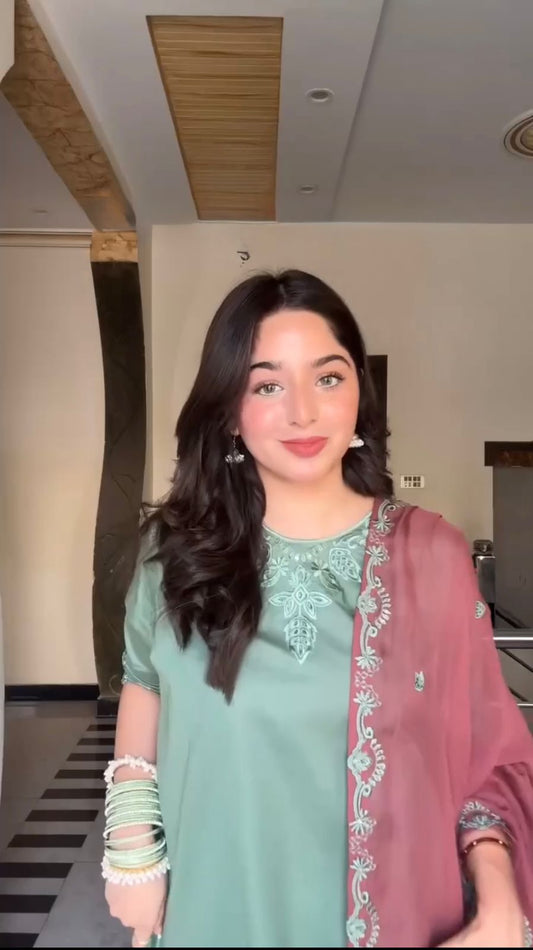 Pastel green salwar suit with pink embroidered dupatta elegance