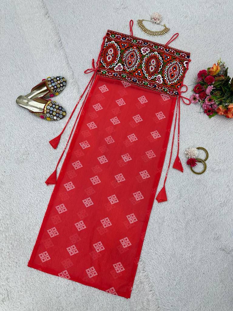 Red bandhani dress with mirror-work embroidered kutchi style blouse.