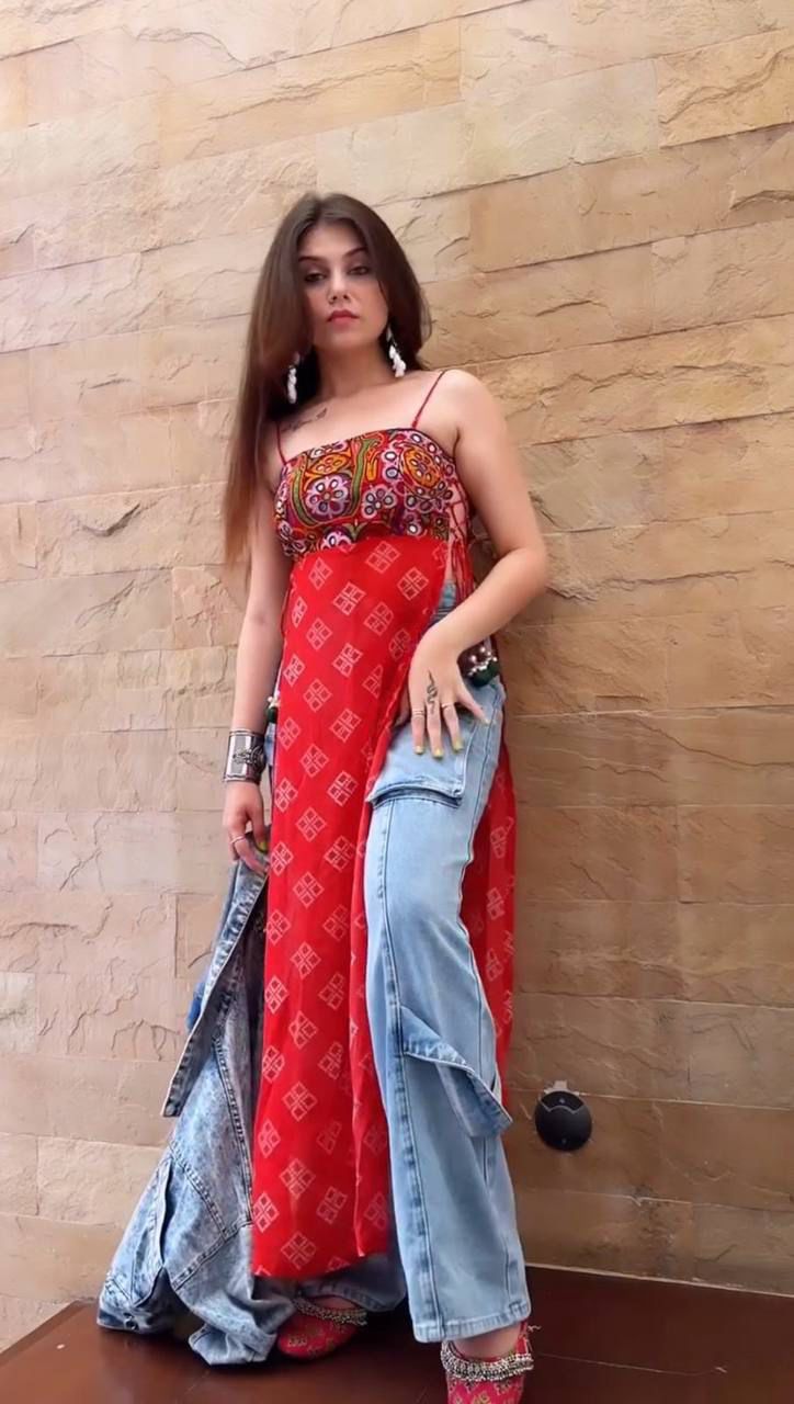 Red bandhani dress with mirror-work embroidered kutchi style blouse.