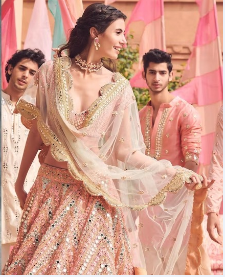 Peach Color Party Wear Designer Net Heavy Embroidered Lehenga