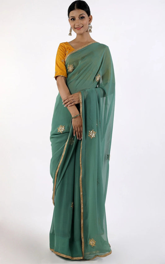 Stylish Dark Green Color Georgette Party Wear Saree